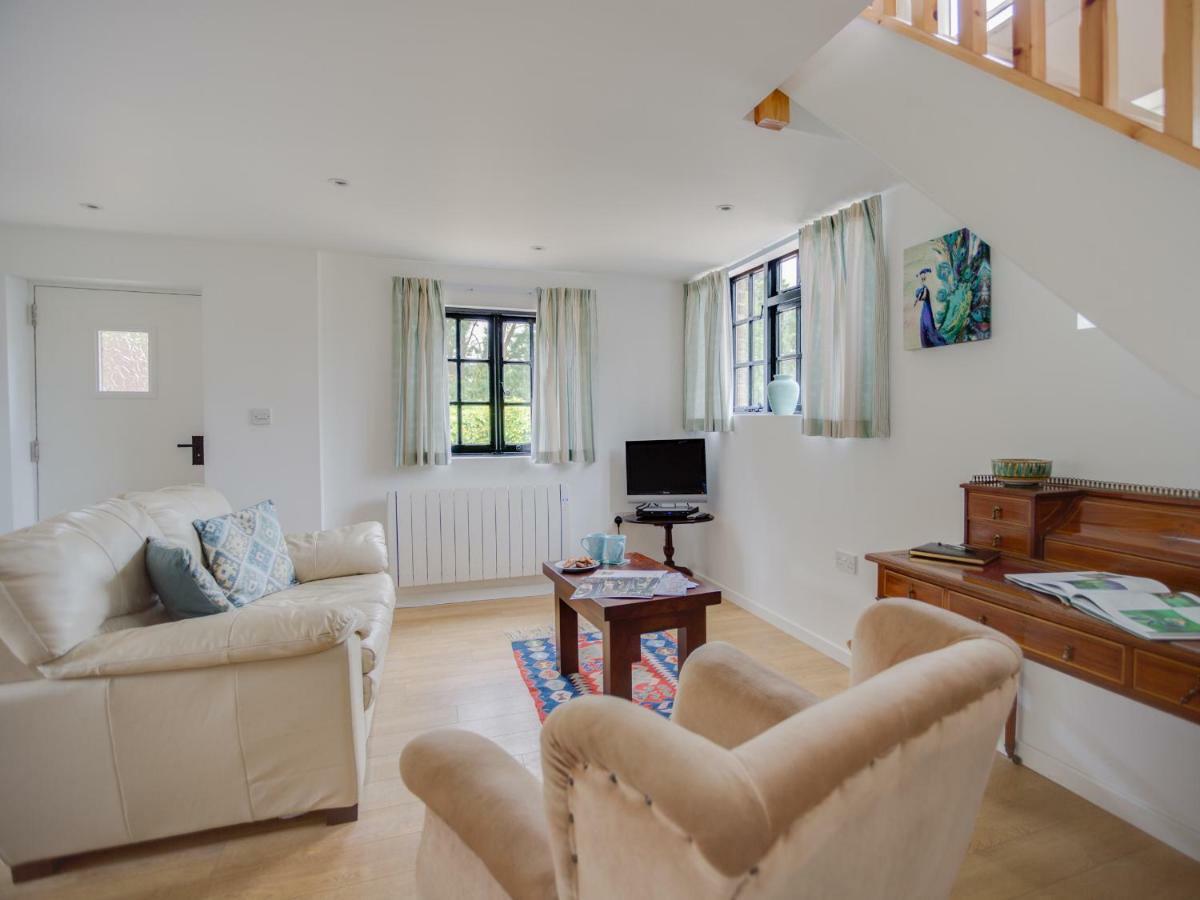 Little England Cottage Milborne Saint Andrew Exterior photo